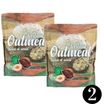 Due confezioni da 1 kg di farina di avena aromatizzata alla nocciola DM Food, ideali per colazioni e ricette fit.